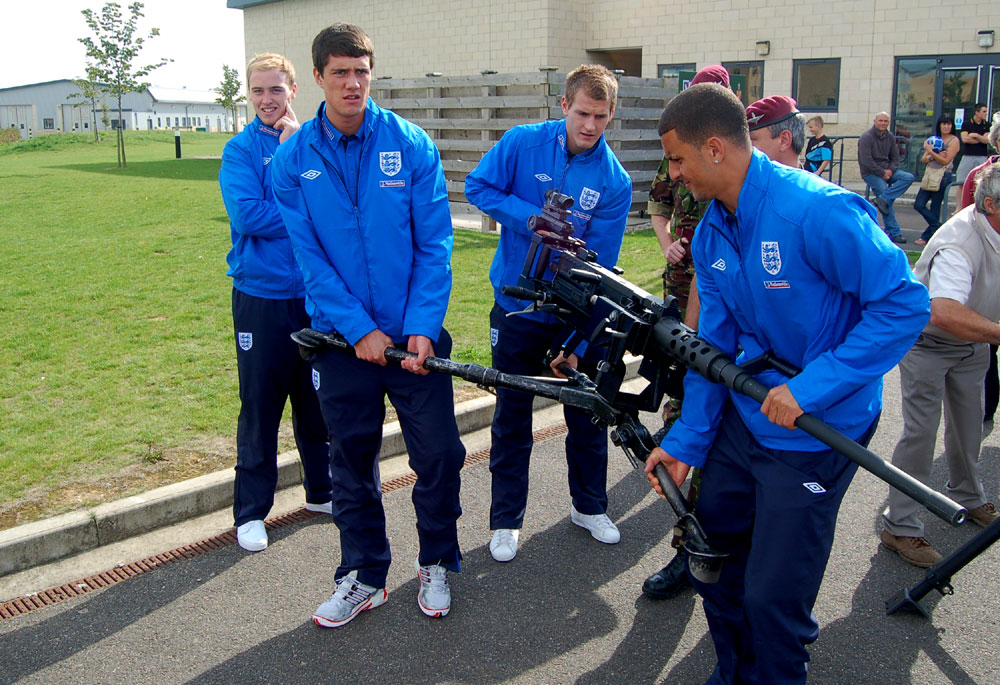 The England players get up close and personal with some heavy machinery.